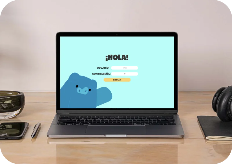 Portátil sobre un escritorio mostrando la pantalla de inicio de sesión de la plataforma de finanzas